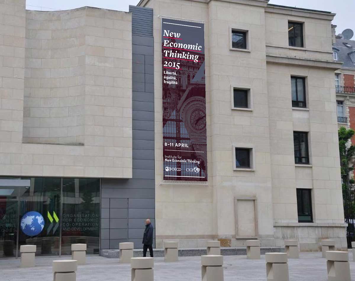 Mockup of Liberté, egalité, fragilité conference banner on exterior of conference venue