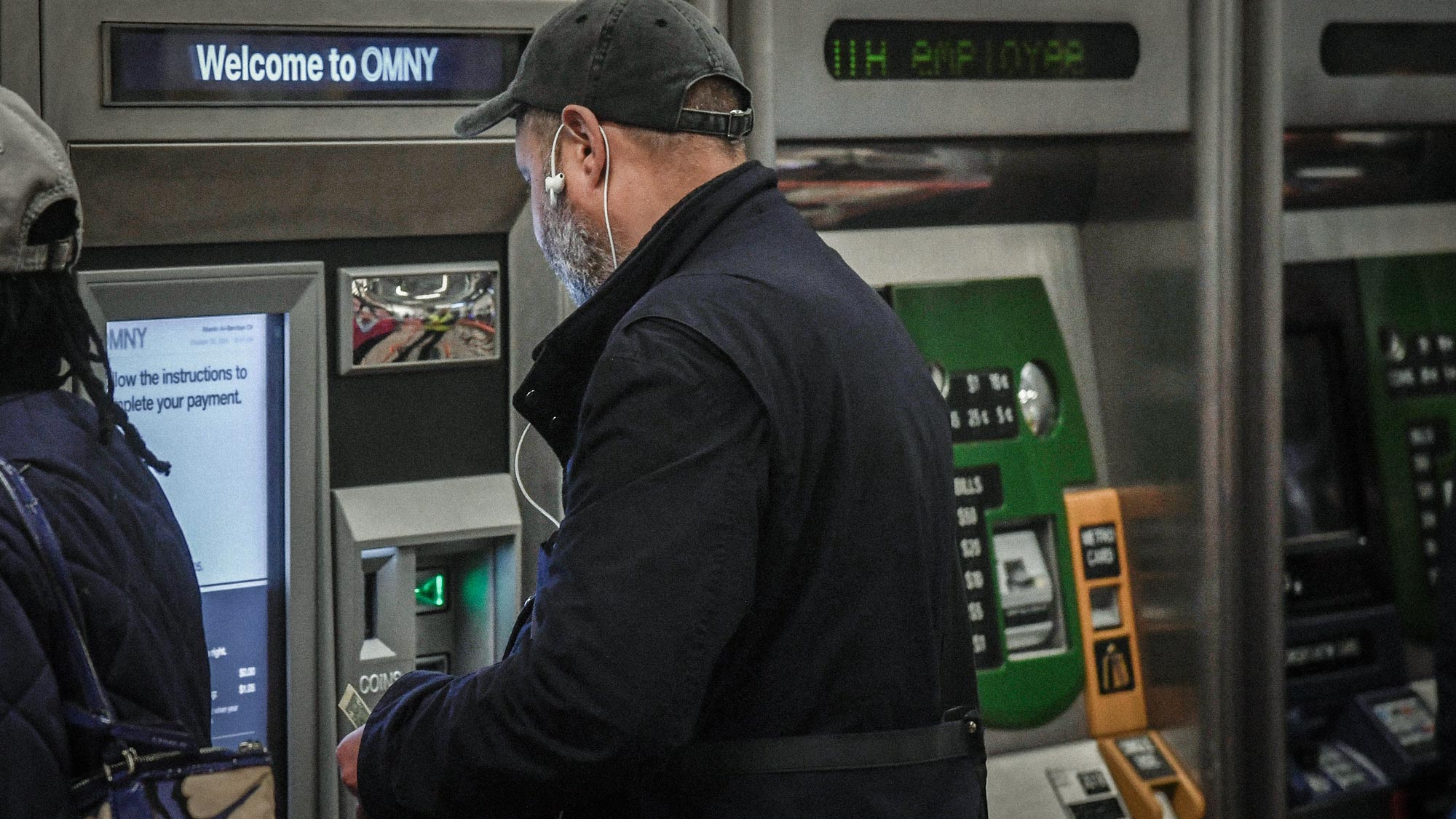 A customer tries out a newly installed OMNY vending machine.